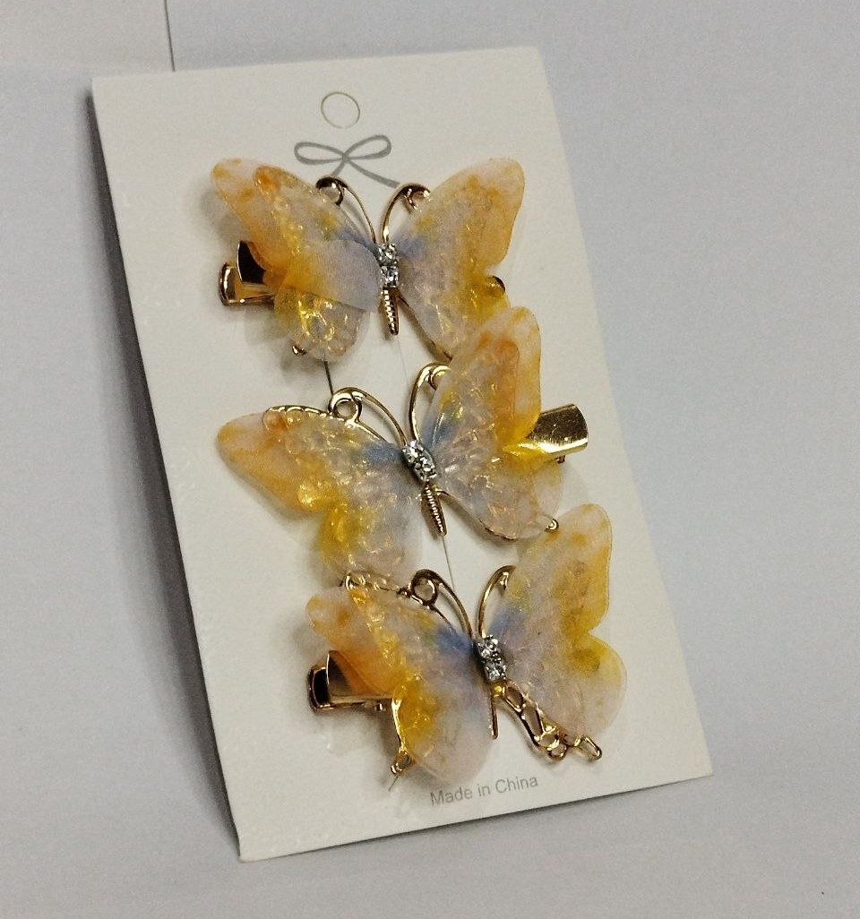 گیره موی سه تایی طرح پروانه دو رنگ دارای رنگبندی در ارزانترین فروشگاه اینترنتی ایران ارزان