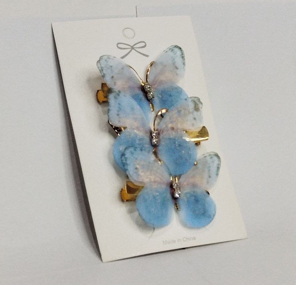 گیره موی سه تایی طرح پروانه دو رنگ دارای رنگبندی ارزانترین فروشگاه اینترنتی